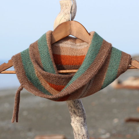 Beautiful handknit cowl with teal, camel, cinnamon and coffee colored stripes